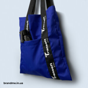 Еко-сумка з трендовим друком по стрічці з кишенькою для Transoft group в кольорі електрик Шопери з кишенькою та брендуванням ручки