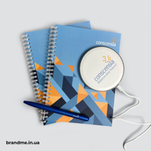 Блокноти та безпровідна зарядка для Conscensia Безпровідна зарядка з брендуванням